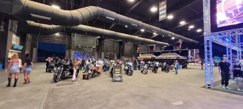 Indoor bike show hall full of motorcycles and visitors at Arizona Bike Week 2024