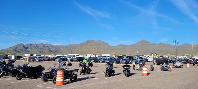 Motorcycle parking lot under blue skies at Arizona Bike Week 2024